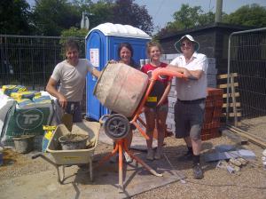 Andy, Kate, Emily and Trevor take a break from shifting blocks